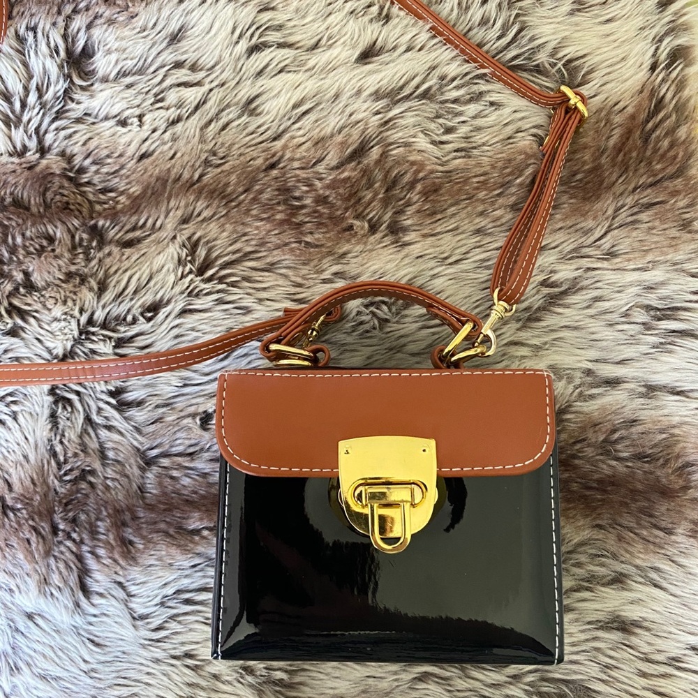 Cooperative two toned boxy patent leather bag